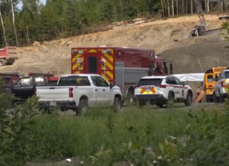 Accident de travail : camionneur coincé sous un camion-benne