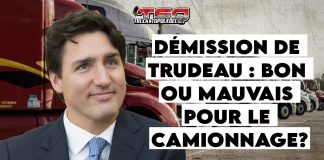 Justin Trudeau démissionne : quel avenir pour l’équité et la sécurité dans le camionnage? Justin Trudeau photographié devant un camion, soulignant l'absence de reconnaissance concrète envers les camionneurs au cours de son mandat.