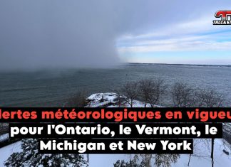 Alertes météorologiques en vigueur pour l’Ontario, le Michigan, le Vermont, et New York Une tempête de neige causée par l’effet de lac, avec des conditions difficiles incluant de fortes chutes de neige, une visibilité réduite, et des routes enneigées, affectant plusieurs régions, représentant les alertes météorologiques en vigueur.