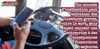 Un conducteur de camion distrait cause un accident et le jury accorde $31 millions à la victime Photo d’un conducteur de camion qui texte avec son cellulaire au volant, représentant les conséquences graves de la distraction au volant pour les camionneurs et les entreprises de transport.
