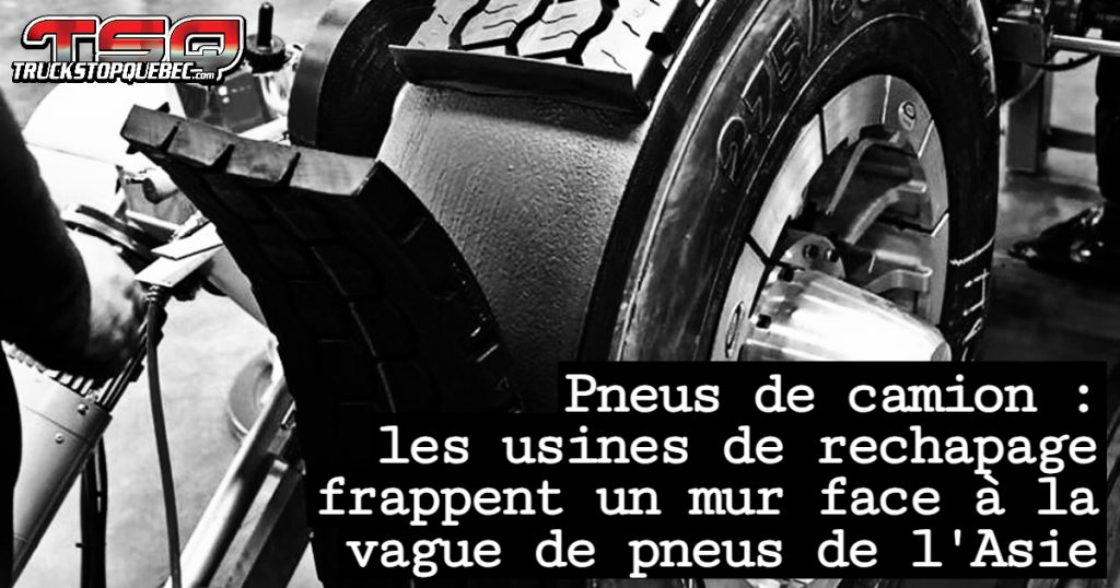 Pneus de camion rechapé dans une usine de fabrication au Québec, illustrant le processus de reconditionnement.