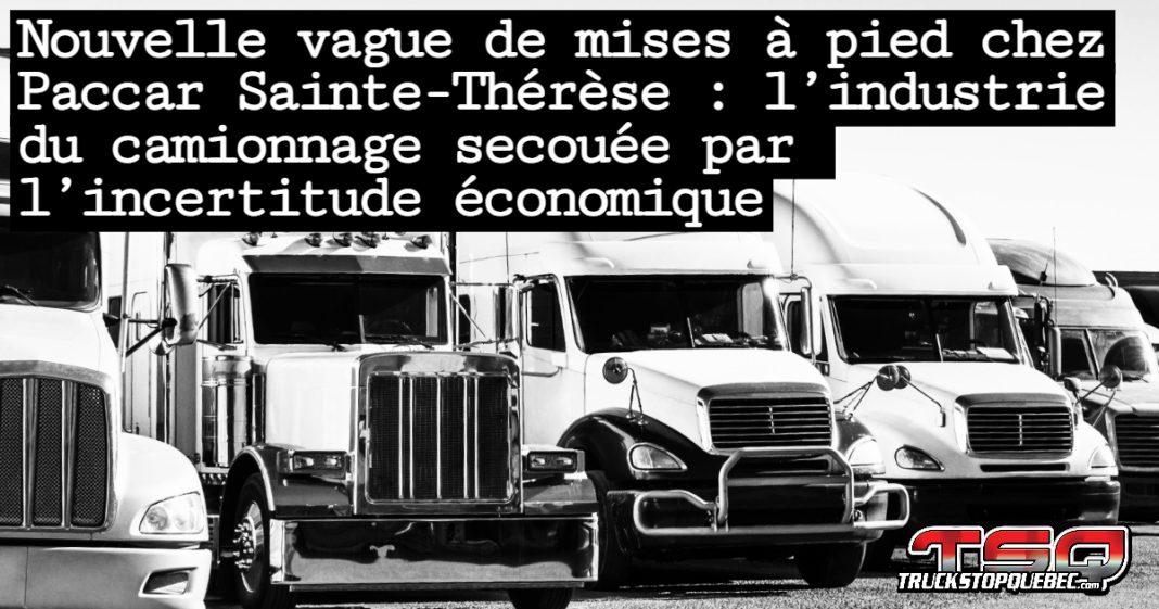 Camions stationnés, symbolisant les mises à pieds à l’usine Paccar de Sainte-Thérèse, au Québec, où 175 travailleurs perdront leur emploi en raison des défis économiques.