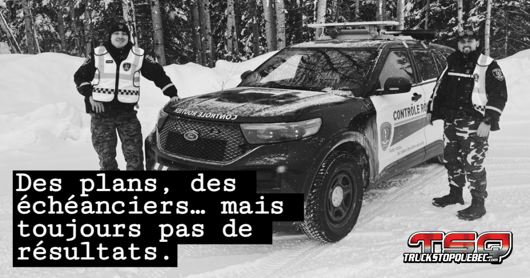 Deux contrôleurs routiers de Contrôle routier Québec debout près d’un véhicule de patrouille stationné, symbolisant le jugement du TAT et les dérogations qui empêchent présentement les agents de faire leur travail sur la route en patrouille active.