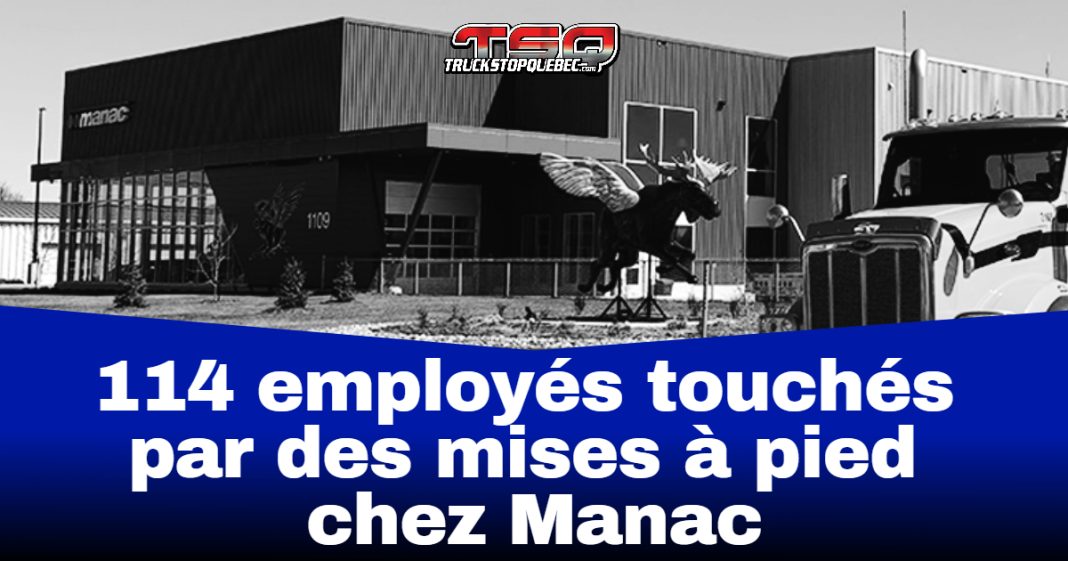 Façade de l’usine Manac à Saint-Georges, avec camion stationné devant, illustrant les mises à pied de 114 employés dans le secteur du camionnage.