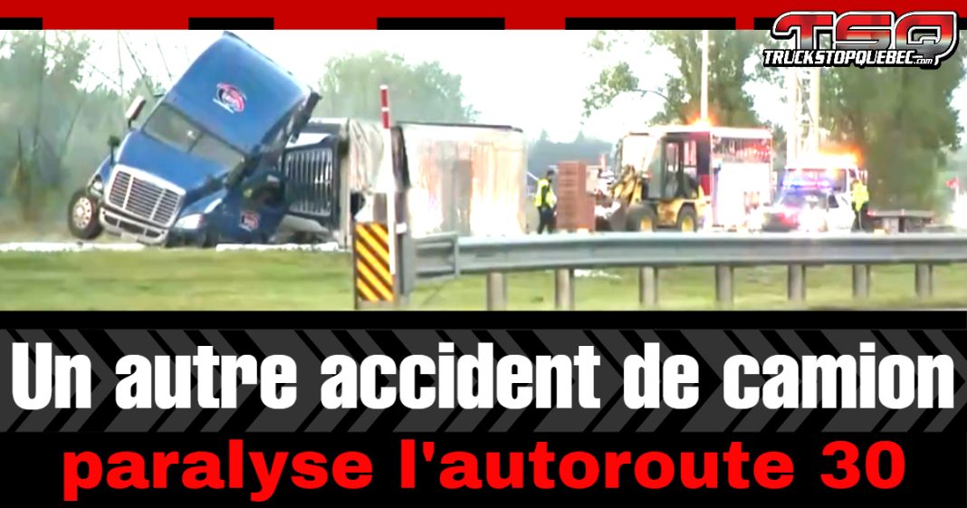 Image d’un camion semi-remorque accidenté et couché sur le côté, avec pompiers et véhicules d’urgence sur place. Texte : « Un autre accident de camion paralyse l’autoroute 30 ». 