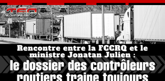 Rencontre entre la FCCRQ et le ministre Jonatan Julien : le dossier des contrôleurs routiers traine toujours Camions en ligne à un poste de contrôle routier, illustrant la surveillance du transport routier et les enjeux entourant le travail des contrôleurs routiers, avec le texte : Rencontre entre la FCCRQ et le ministre Jonatan Julien : le dossier des contrôleurs routiers traine toujours.