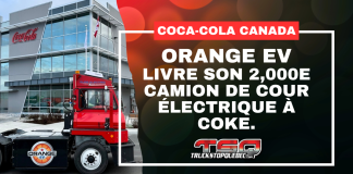Orange EV livre son 2 000e camion de cour électrique (shunter) à Coke Canada Bottling Camion de cour électrique Orange EV devant un bâtiment Coca-Cola, avec le texte : « Coca-Cola Canada — Orange EV livre son 2,000e camion de cour électrique à Coke. »