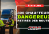 Près de 800 chauffeurs et véhicules mis hors service aux États-Unis Des agents inspectent des camions lourds en bordure d’une autoroute américaine, avec la mention « 800 chauffeurs dangereux retirés des routes ».